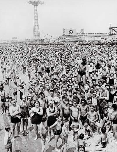 Weegee-masked-man-Coney-Island-520